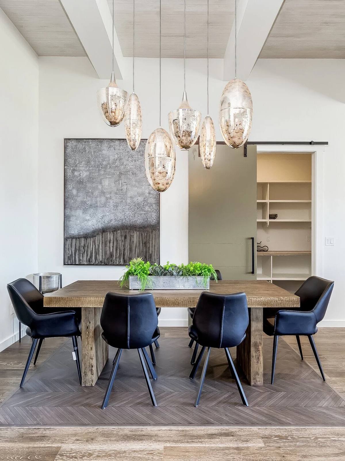 Luxury dining room with pendant lights