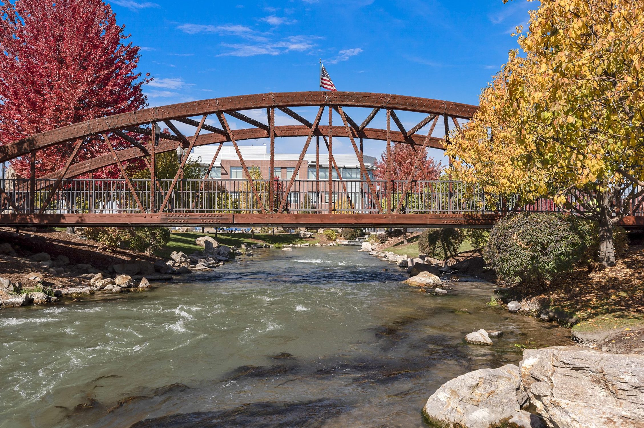 Red metal bridge over Indian Creek in downtown Caldwell, Idaho
