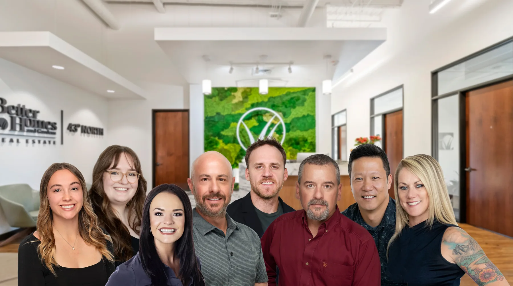 The BHGRE 43° North marketing, concierge and broker team in the office lobby